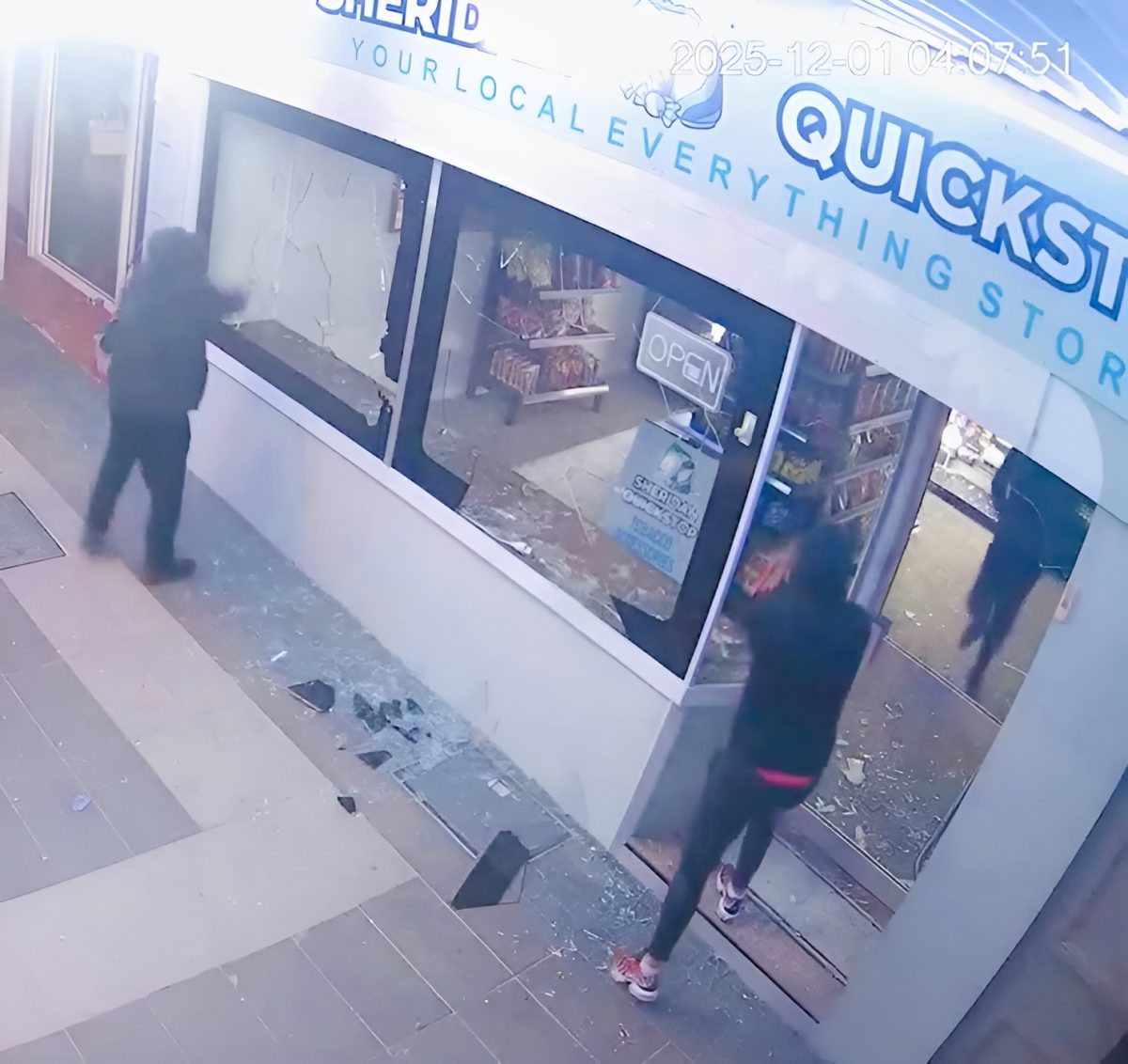 Men smashing windows 